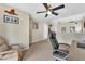 Cozy office space with lots of natural light, ceiling fan and neutral carpeted floors at 9737 Darlington Ct, Las Vegas, NV 89149