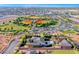 An aerial shot of a home and community with community baseball field at 9920 Rancho Destino Rd, Las Vegas, NV 89183