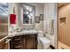 Bathroom featuring vanity with marble countertop and glass-enclosed shower at 9920 Rancho Destino Rd, Las Vegas, NV 89183