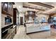Gourmet kitchen showcasing a large island, stainless steel appliances, and custom wood cabinetry at 9920 Rancho Destino Rd, Las Vegas, NV 89183