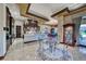Open concept kitchen with breakfast nook, custom cabinetry, and easy access to outdoor spaces at 9920 Rancho Destino Rd, Las Vegas, NV 89183