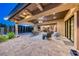 Spacious outdoor patio area with comfortable seating and an open view to the yard at 9920 Rancho Destino Rd, Las Vegas, NV 89183