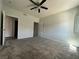 Bright bedroom with neutral carpet, ceiling fan and fresh, neutral paint at 7701 W Robindale Rd # 127, Las Vegas, NV 89113