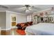 Spacious bedroom with hardwood floors, ceiling fan, bathroom access, and two beds at , Las Vegas, NV 89148