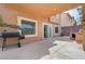 Covered patio with barbecue, exterior access and room for entertaining at 11120 Whooping Crane Ln, Las Vegas, NV 89144