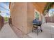 Patio with a grill and easy access to the side yard and alley at 11120 Whooping Crane Ln, Las Vegas, NV 89144