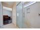 Clean bathroom with tile floor and a glass shower with shower niche at 11120 Whooping Crane Ln, Las Vegas, NV 89144