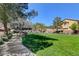 Community park with picnic tables and lush green space at 11120 Whooping Crane Ln, Las Vegas, NV 89144