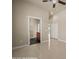The tiled bedroom features an ensuite bathroom, closet, and neutral paint at 1348 Basin Vw, Mesquite, NV 89034