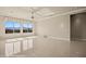 An open living room with large windows featuring a scenic mountain view at 1348 Basin Vw, Mesquite, NV 89034