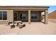 Outdoor patio area featuring a stone table with benches at 1348 Basin Vw, Mesquite, NV 89034