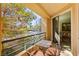 View from balcony features a table, chairs, and neighborhood views at 220 E Flamingo Rd # 111, Las Vegas, NV 89169