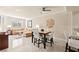 Spacious living area featuring a comfortable sofa, dining table, and stylish decor at 220 E Flamingo Rd # 111, Las Vegas, NV 89169