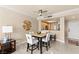 Inviting dining space with a modern table, comfortable seating, and stylish lighting at 220 E Flamingo Rd # 111, Las Vegas, NV 89169