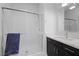 This bathroom features a glass-enclosed shower, sleek vanity, and modern fixtures at 298 Watteau Ct, Henderson, NV 89012