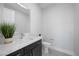 Modern half bathroom with sleek vanity, stylish fixtures, and a neutral color palette at 298 Watteau Ct, Henderson, NV 89012