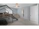 Cozy bedroom with a modern bed, ceiling fan, and carpet floors at 298 Watteau Ct, Henderson, NV 89012