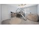 Bedroom features a modern bed, a bookshelf, carpet floors and a ceiling fan at 298 Watteau Ct, Henderson, NV 89012