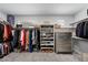 Organized walk-in closet with ample storage space for clothing, shoes, and accessories at 298 Watteau Ct, Henderson, NV 89012