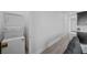 Hallway features stackable washer/dryer and wood flooring at 298 Watteau Ct, Henderson, NV 89012