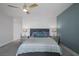 Cozy main bedroom featuring a comfortable king-size bed, side tables, and neutral decor at 298 Watteau Ct, Henderson, NV 89012