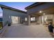 Open patio with sliding glass doors and comfortable seating offers seamless indoor-outdoor living at 298 Watteau Ct, Henderson, NV 89012