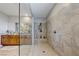 This large bathroom features a tiled walk-in shower with glass surround and a double sink vanity at 3360 Lochside Dr, Henderson, NV 89044