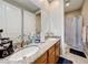 Bathroom with double sinks, granite countertops, and a shower/tub combination at 3360 Lochside Dr, Henderson, NV 89044