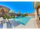Inviting pool area featuring a tranquil lounge space for relaxation and enjoyment at 3360 Lochside Dr, Henderson, NV 89044