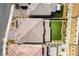 An aerial view showcases the property's roof, manicured backyard with artificial turf, and desert landscaping at 395 Prairie Sun St, Las Vegas, NV 89138