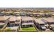 Expansive aerial view of a residential community featuring well-maintained backyards and inviting outdoor living spaces at 395 Prairie Sun St, Las Vegas, NV 89138