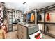 Spacious closet with custom shelving, ample storage, and an island for organizing accessories at 395 Prairie Sun St, Las Vegas, NV 89138