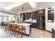 Spacious kitchen with seating at the island and stainless steel appliances at 395 Prairie Sun St, Las Vegas, NV 89138