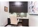 Cozy home office nook with built-in cabinets, marble countertop, and overhead lighting at 395 Prairie Sun St, Las Vegas, NV 89138