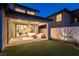 Inviting outdoor patio with stylish furniture and seamless transition to indoor living space, perfect for relaxation and entertaining at 395 Prairie Sun St, Las Vegas, NV 89138
