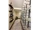 Contemporary wine storage area with decorative shelving and designer accents at 395 Prairie Sun St, Las Vegas, NV 89138