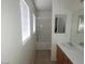 Clean bathroom features single sink, oak cabinet, and a tub shower combination for convenience at 520 Shire Hall St, Las Vegas, NV 89178
