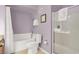 Well-lit bathroom with a shower-tub combination and glass-enclosed shower at 10001 Peace Way # 2277, Las Vegas, NV 89147
