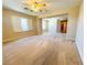 Bonus room featuring soft carpeting, multiple windows, and decorative lighting at 10013 Scenic Walk Ave, Las Vegas, NV 89149