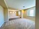 Spacious bonus room offering neutral carpeting, recessed lighting, and bright windows at 10013 Scenic Walk Ave, Las Vegas, NV 89149