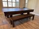A versatile dining/game table set in a room with neutral tones and natural light, perfect for entertaining guests at 10013 Scenic Walk Ave, Las Vegas, NV 89149