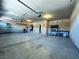 Spacious garage featuring ample storage options and functional layout, ready for various projects and parking at 10013 Scenic Walk Ave, Las Vegas, NV 89149