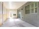 Covered patio with concrete flooring, sliding glass door and stucco exterior at 10013 Scenic Walk Ave, Las Vegas, NV 89149