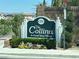 The Collina at Grand Teton Village community sign with lush landscaping at 10013 Scenic Walk Ave, Las Vegas, NV 89149