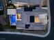 An aerial view of a home with solar panels and a stunning backyard pool at 10756 Steel Ridge Ct, Las Vegas, NV 89135