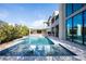 Amazing backyard with pool and in-pool loungers at 10756 Steel Ridge Ct, Las Vegas, NV 89135
