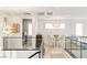 Upper level dining area with a stylish chandelier at 10756 Steel Ridge Ct, Las Vegas, NV 89135