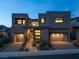 Stunning modern home showcasing sleek architectural design, professional landscaping, and a welcoming entrance at 10756 Steel Ridge Ct, Las Vegas, NV 89135
