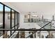 Open-concept upper level with modern railings and bright natural light at 10756 Steel Ridge Ct, Las Vegas, NV 89135