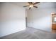 Bedroom with ceiling fan and carpet at 10980 Ampus Pl, Las Vegas, NV 89141